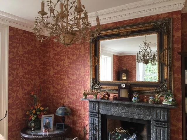 Restored period fireplace, decorative cornice and interior finishes