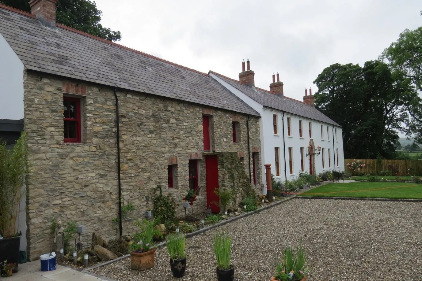 Restored stone barn beside the original house