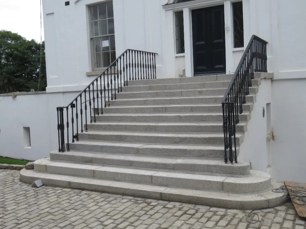 Extended entrance steps and replicated railings