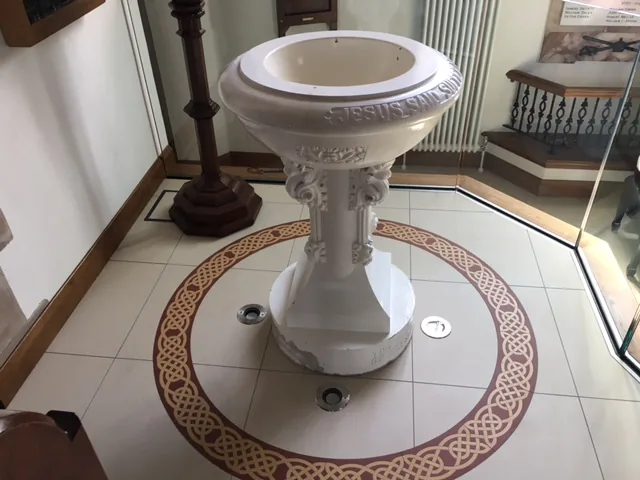 Detailed view of the restored font at St Colman’s
