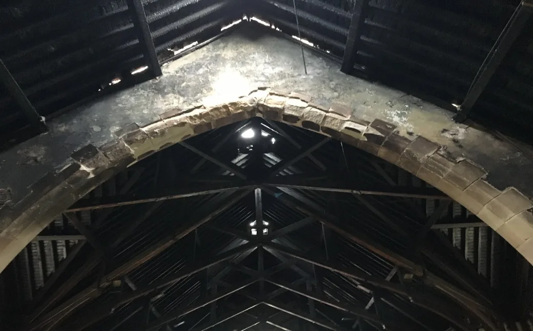 Damaged sandstone arch and roof structure